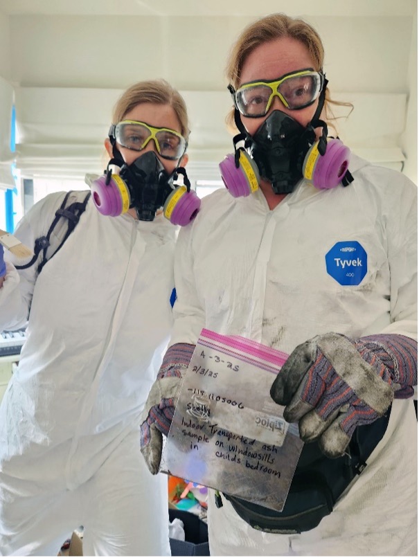 Bumstead and Knack hold labeled ash samples