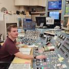 Novotny operating the cyclotron in the control room